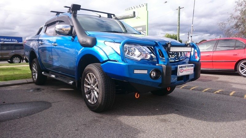 Mitsubishi Triton with Opposite Lock bull bar, snorkel and UHF antenna